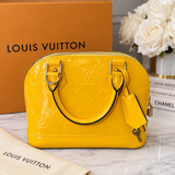 Authentic Louis Vuitton Alma BB Yellow Monogram Vernis Patent Leather Handbag